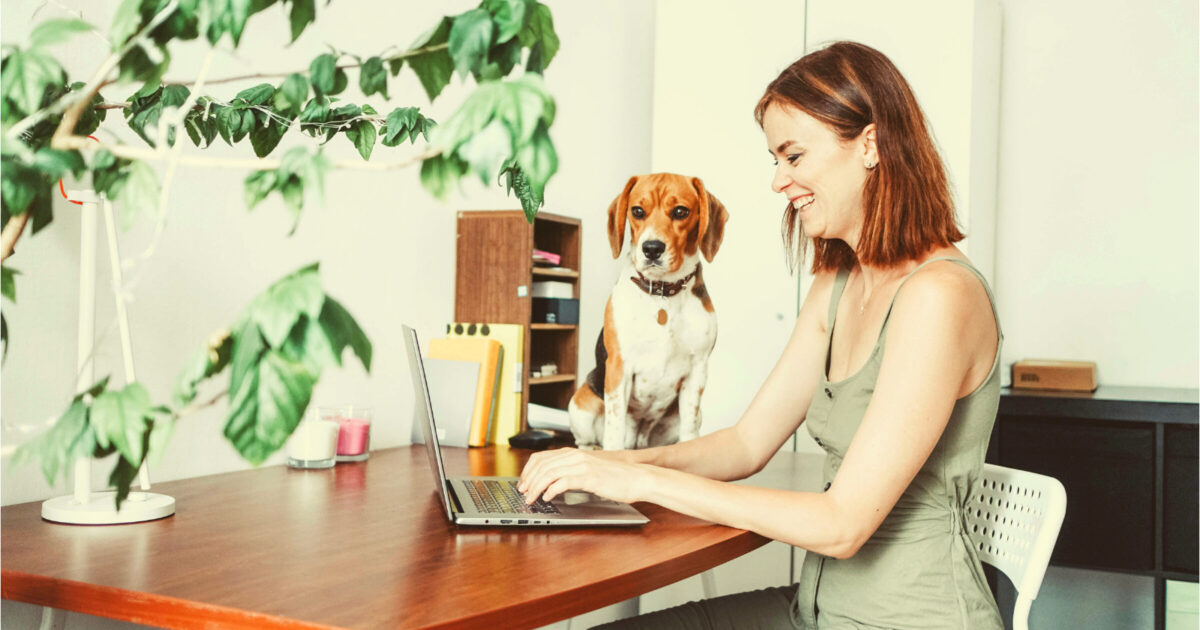 Woman Working from Home with Dog